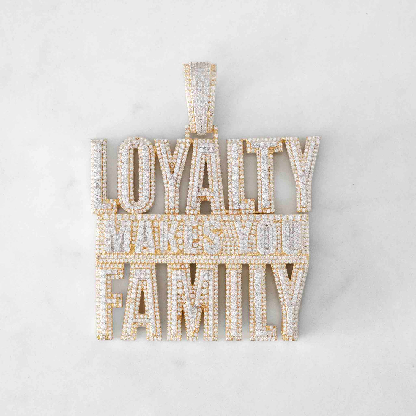 Front side of loyalty makes you family iced out pendant with hand set CZ stones